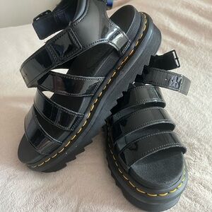 Dr. Martens Blaire: Black Patent Platform Sandals with Yellow Stitching